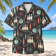 Front view of Atomic Alley Bowling Hawaiian Shirt with original atomic starbursts, simplified ten-pin arrangements and rolling ball paths