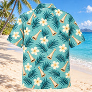Back view of Birth Coast Aqua Sand Midwife Hawaiian Shirt on a Hawaiian beach with fine white or light yellow sand and no dark rocks