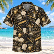 Front view of Black Gold Teacher Hawaiian Shirt with elegant antique-gold original pencils, apples, rulers, books and sheets of paper with fine line geometry