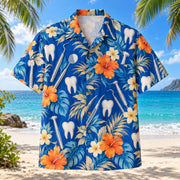 Front view of Dental Tools Dentist Hawaiian Shirt with original dental tools motifs, with tropical botanical accents; no text or branded equipment