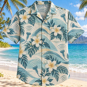 Front view of Echo Waves Aqua Sand Diagnostic Medical Sonographer Hawaiian Shirt on a Hawaiian beach with fine white or light yellow sand and no dark rocks