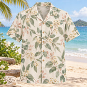 Front view of Eucalyptus Shore Beach Wedding Hawaiian Shirt with original, text-free illustrations of eucalyptus branches and small cream blooms