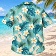 Back view of Foot Mold Coast Aqua Sand Orthotist and Prosthetist Hawaiian Shirt on a Hawaiian beach with fine white or light yellow sand and no dark rocks