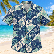 Front view of Hearing Wave Navy Audiologist Hawaiian Shirt with original fictional audiogram curves and waves in a large focal motifs with small botanical echoes