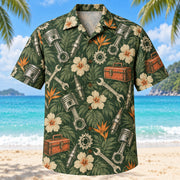 Front view of Heritage Trails Mechanic Hawaiian Shirt with vintage-inspired engraved generic pistons, spark plugs, wrenches, toolboxes and gears with subtle botanical shadows