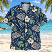 Front view of Instrument Garden Navy Cream Surgical Technologist Hawaiian Shirt with original generic closed clamps, scissors and instrument trays among tropical leaves