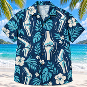 Front view of Joint Motion Navy Physical Therapist Hawaiian Shirt on a Hawaiian beach with fine white sand