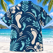 Back view of Motion Steps Navy Physical Therapist Hawaiian Shirt on a Hawaiian beach with fine white sand