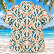 Back view of Motion Steps Sunset Physical Therapist Hawaiian Shirt on a Hawaiian beach with fine white sand
