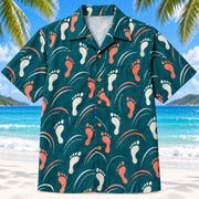 Front view of Motion Steps Teal Physical Therapist Hawaiian Shirt on a Hawaiian beach with fine white sand