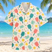 Front view of Pickleball Confetti Hawaiian Shirt with rhythmic scattered generic paddle icons, perforated balls, tiny court corners and abstract festive shapes, tasteful clear spacing