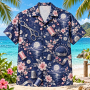 Front view of Sewing Night Sewing and Quilting Hawaiian Shirt with generic sewing tools among moonlit blossoms