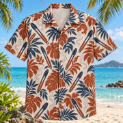 Front view of Tongs and Flame BBQ Hawaiian Shirt with generic grilling tongs and gentle smoke among leaves