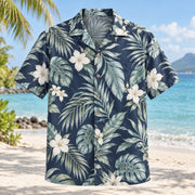 Front view of Tropical Formal Beach Wedding Hawaiian Shirt with original, text-free illustrations of restrained tropical leaves and pale blooms for coordinated groups